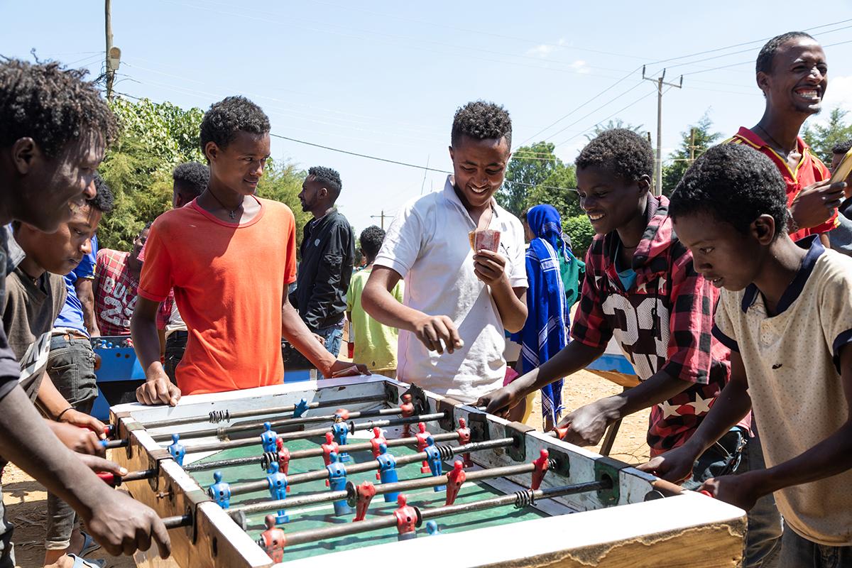 boys playing table football