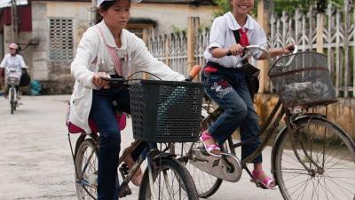 two girls on bikes